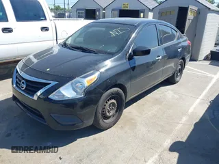 2015 Nissan Versa SV with VIN 3N1CN7AP2FL957991, listed as a IAAI auction lot 42060362 with 136,762 mi miles. Bid and sale history available at carsss.com. Image 2.