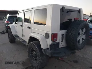 2010 Jeep Wrangler Unlimited Sahara with VIN 1J4BA5H15AL184376, listed as a IAAI auction lot 41270637 with 143,339 mi miles. Bid and sale history available at carsss.com. Image 3.
