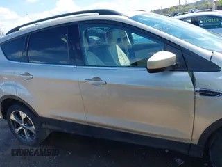 2018 Ford Escape SEL with VIN 1FMCU9HD1JUD49543, listed as a IAAI auction lot 42003218 with 122,768 mi miles. Bid and sale history available at carsss.com. Image 13.