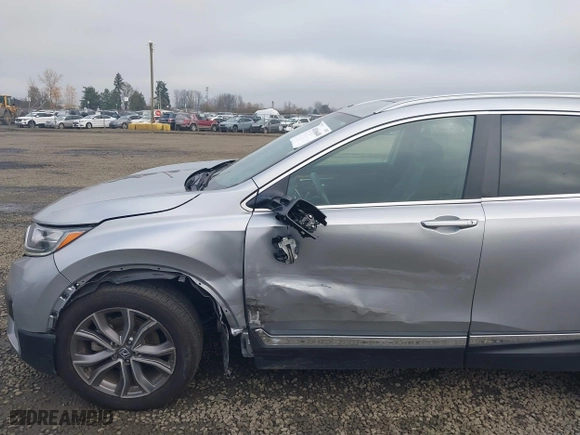 2021 Honda CR-V Touring with VIN 2HKRW2H9XMH212692, listed as a IAAI auction lot 41016640 with 24,149 mi miles. Bid and sale history available at carsss.com. Image 6.
