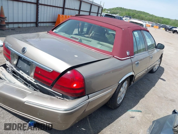 2004 Mercury Grand Marquis LS Premium z VIN 2MEFM75W34X674542, wystawiony jako IAAI lot #42018186 z przebiegiem 137 944 mil mil oraz . Historia ofert i sprzedaży dostępna na DreamBid. Obrazek 4.