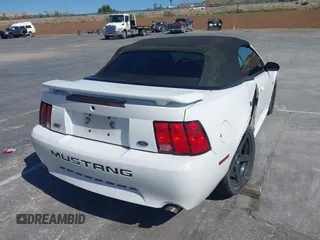 2003 Ford Mustang GT Deluxe with VIN 1FAFP45X23F374605, listed as a IAAI auction lot 41992631 with 123,760 mi miles. Bid and sale history available at carsss.com. Image 4.