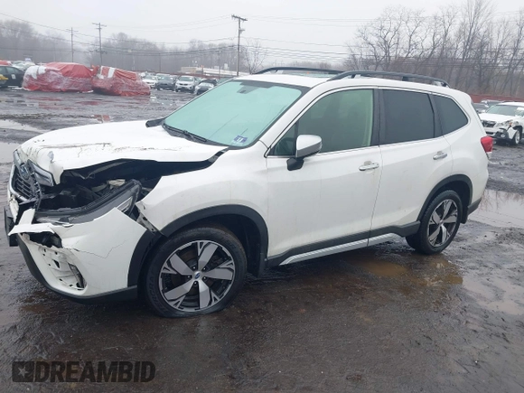 2019 Subaru Forester Touring with VIN JF2SKAWC3KH555900, listed as a IAAI auction lot 41558281 with 138,351 mi miles. Bid and sale history available at carsss.com. Image 19.