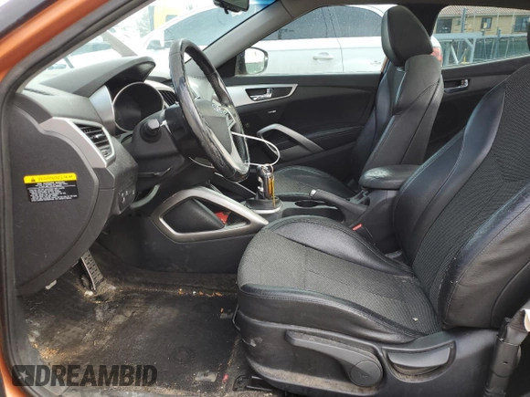 2014 Hyundai Veloster with VIN KMHTC6AD6EU185899, listed as a Copart auction lot 49871335 with 112,787 mi miles and Salvage Title. Bid and sale history available at carsss.com. Image 7.
