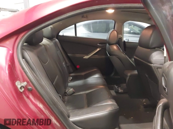 2009 Pontiac G6 GXP 1SA with VIN 1G2ZM577X94157511, listed as a IAAI auction lot 42296880 with 143,960 mi miles and . Bid and sale history available at DreamBid. Image 8.