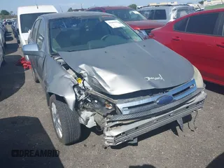 2008 Ford Focus SE with VIN 1FAHP35N88W242103, listed as a IAAI auction lot 39468422 with 169,911 mi miles. Bid and sale history available at carsss.com. Image 6.