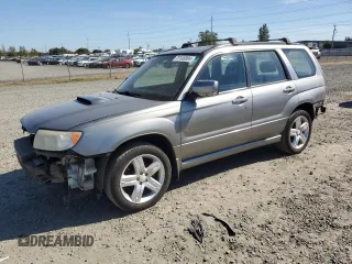 2007 Subaru Forester Sports XT with VIN JF1SG69677H709010, listed as a Copart auction lot 72143004 with 153,460 mi miles and Salvage Title. Bid and sale history available at carsss.com. Image 1.