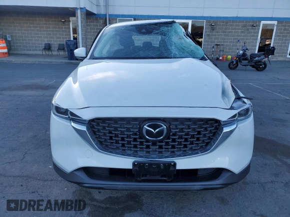 2023 Mazda CX-5 2.5 S with VIN JM3KFBAM6P0269481, listed as a Copart auction lot 87222194 with 21,070 mi miles and Salvage Title. Bid and sale history available at carsss.com. Image 5.