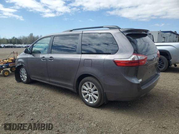 2015 Toyota Sienna LE with VIN 5TDJK3DC7FS121635, listed as a Copart auction lot 55999945 with 139,642 mi miles and Salvage title. Bid and sale history available at DreamBid. Image 2.