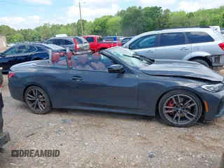 2021 BMW 4 Series M440i with VIN WBA53AT05MCG89665, listed as a IAAI auction lot 42319456 with Not provided miles and . Bid and sale history available at DreamBid. Image 13.
