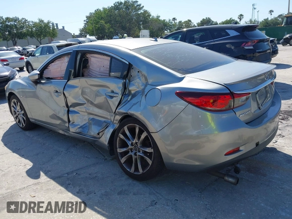 2014 Mazda 6 i Grand Touring с VIN JM1GJ1W6XE1159641, выставлен на аукционе IAAI как лот 39305628 с пробегом 107 853 миль миль и . История ставок и продаж доступна на DreamBid. Изображение 3.