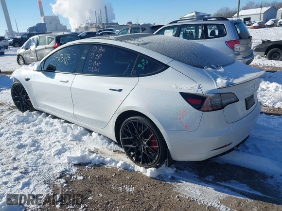 2021 Tesla Model 3 Performance with VIN 5YJ3E1EC1MF063445, listed as a IAAI auction lot 41293243 with 43,143 mi miles and . Bid and sale history available at DreamBid. Image 3.