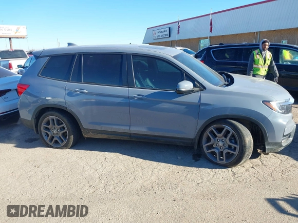 2022 Honda Passport EX-L with VIN 5FNYF7H57NB005716, listed as a IAAI auction lot 41078499 with 33,141 mi miles and . Bid and sale history available at DreamBid. Image 13.