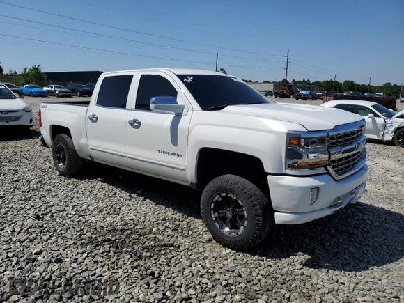 2016 Chevrolet Silverado 1500 LT with VIN 3GCUKREC9GG185402, listed as a Copart auction lot 52292115 with 131,861 mi miles and Salvage Title. Bid and sale history available at DreamBid. Image 4.