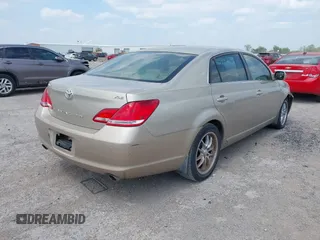 2005 Toyota Avalon XL with VIN 4T1BK36B15U007967, listed as a IAAI auction lot 42060604 with 286,766 mi miles and . Bid and sale history available at DreamBid. Image 4.