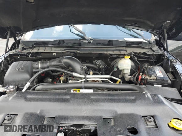 2016 Ram 1500 Rebel z VIN 1C6RR7YT0GS336788, wystawiony jako Copart lot #58507795 z przebiegiem Nie podano mil oraz Szkody całkowita. Historia ofert i sprzedaży dostępna na DreamBid. Obrazek 11.