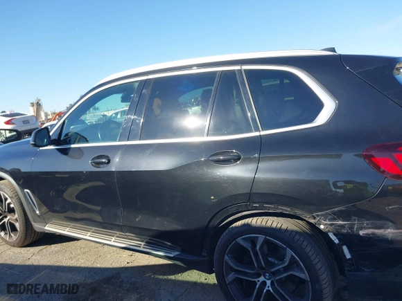 2023 BMW X5 sDrive40i with VIN 5UXCR4C00P9P46054, listed as a IAAI auction lot 41627025 with 20,152 mi miles. Bid and sale history available at carsss.com. Image 14.