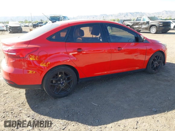 2016 Ford Focus SE with VIN 1FADP3F2XGL256037, listed as a IAAI auction lot 42047789 with 130,274 mi miles. Bid and sale history available at carsss.com. Image 4.
