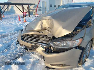 2016 Ford Fusion SE Hybrid with VIN 3FA6P0LU8GR127311, listed as a IAAI auction lot 41242945 with 1 mi miles. Bid and sale history available at carsss.com. Image 6.
