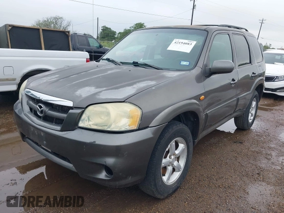 2005 Mazda Tribute S with VIN 4F2YZ04135KM05678, listed as a IAAI auction lot 42194083 with 283,488 mi miles and . Bid and sale history available at carsss.com. Image 2.