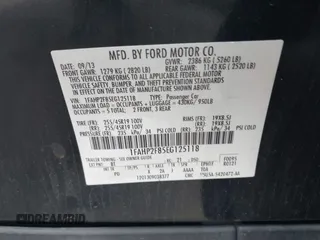 2014 Ford Taurus Limited z VIN 1FAHP2F85EG125118, wystawiony jako IAAI lot #42457437 z przebiegiem 129 406 mil mil oraz . Historia ofert i sprzedaży dostępna na DreamBid. Obrazek 9.