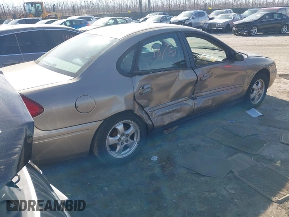 2004 Ford Taurus SE with VIN 1FAFP532X4G152810, listed as a IAAI auction lot 41639876 with 98,718 mi miles and . Bid and sale history available at DreamBid. Image 4.