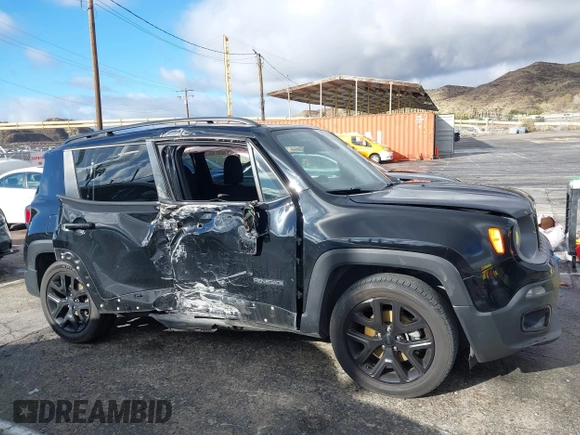 2018 Jeep Renegade Altitude with VIN ZACCJABB6JPH40341, listed as a IAAI auction lot 41582205 with 58,011 mi miles and . Bid and sale history available at DreamBid. Image 13.