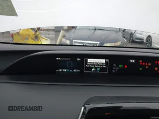 2022 Toyota Prius L Eco with VIN JTDKAMFU1N3177055, listed as a IAAI auction lot 41506862 with 121,318 mi miles and . Bid and sale history available at DreamBid. Image 7.