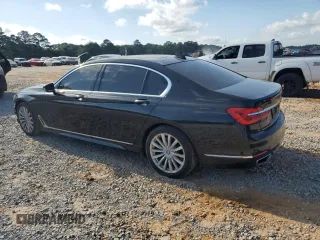 2017 BMW 7 Series 740i with VIN WBA7E2C57HG739482, listed as a Copart auction lot 53652145 with 102,418 mi miles and Salvage title. Bid and sale history available at DreamBid. Image 2.