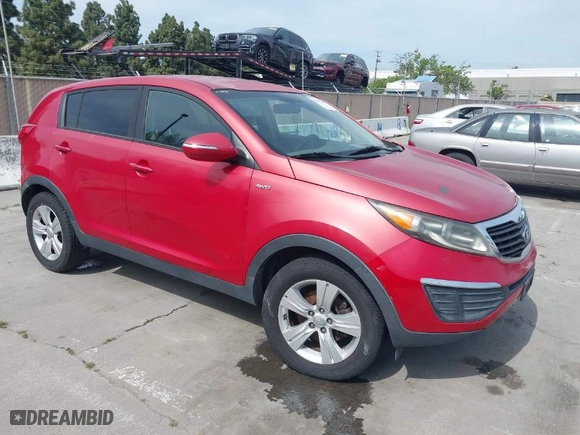 2013 Kia Sportage LX with VIN KNDPBCA26D7355889, listed as a IAAI auction lot 42054415 with 136,859 mi miles. Bid and sale history available at carsss.com. Image 1.
