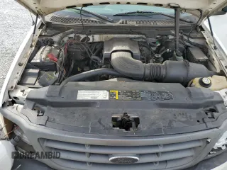 2003 Ford F-150 XL z VIN 1FTRF18W53NB45997, wystawiony jako Copart lot #42451525 z przebiegiem 149 166 mil mil oraz Szkoda całkowita • Salvage title. Historia ofert i sprzedaży dostępna na DreamBid. Obrazek 12.