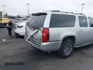 2010 Chevrolet Suburban LT with VIN 1GNUCJE03AR238548, listed as a IAAI auction lot 42104596 with 153,959 mi miles and . Bid and sale history available at DreamBid. Image 4.