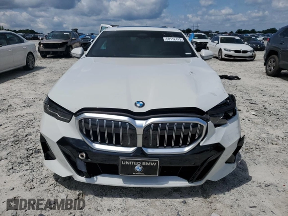 2024 BMW 5 Series 540i xDrive with VIN WBA63FJ04RCS00990, listed as a Copart auction lot 60112415 with Not provided miles and Salvage title. Bid and sale history available at DreamBid. Image 5.