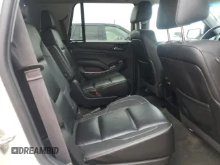 2015 Chevrolet Tahoe LT z VIN 1GNSKBKC5FR186507, wystawiony jako Copart lot #57157515 z przebiegiem 173 162 mil mil oraz Szkoda całkowita • Salvage title. Historia ofert i sprzedaży dostępna na DreamBid. Obrazek 11.