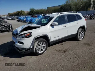 2016 Jeep Cherokee Latitude with VIN 1C4PJMCS6GW104936, listed as a Copart auction lot 73612764 with 117,879 mi miles and Salvage Title. Bid and sale history available at carsss.com. Image 1.