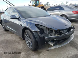 2023 Tesla Model 3 with VIN 5YJ3E1EA4PF569645, listed as a IAAI auction lot 41732477 with 21,007 mi miles and . Bid and sale history available at carsss.com. Image 1.
