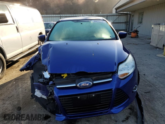 2012 Ford Focus SE with VIN 1FAHP3F22CL233587, listed as a Copart auction lot 48890055 with 71,322 mi miles and Salvage Title. Bid and sale history available at DreamBid. Image 5.
