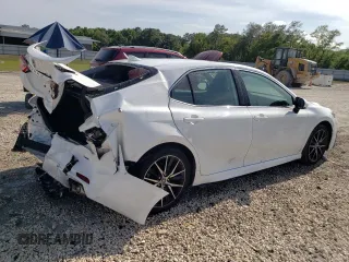 2023 Toyota Camry SE with VIN 4T1G11AKXPU837029, listed as a Copart auction lot 54522985 with 32,984 mi miles and Salvage Title. Bid and sale history available at DreamBid. Image 3.