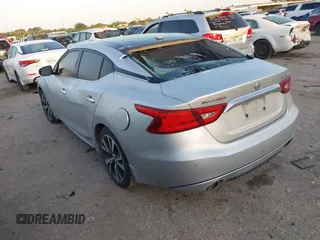 2016 Nissan Maxima SR z VIN 1N4AA6AP9GC382348, wystawiony jako IAAI lot #42012121 z przebiegiem 203 513 mil mil oraz . Historia ofert i sprzedaży dostępna na DreamBid. Obrazek 3.