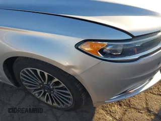 2017 Ford Fusion Hybrid Titanium with VIN 3FA6P0RU8HR190482, listed as a IAAI auction lot 41322244 with 137,539 mi miles and . Bid and sale history available at DreamBid. Image 18.