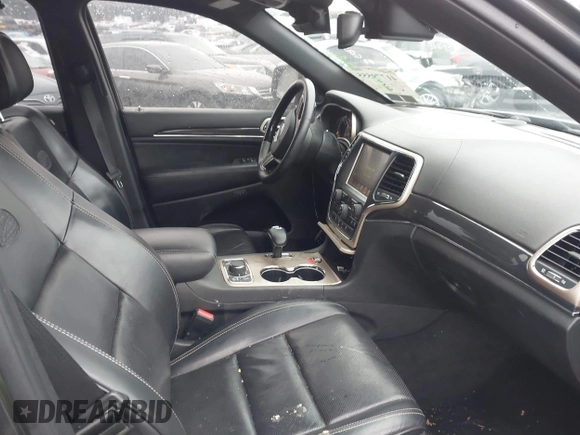 2015 Jeep Grand Cherokee Overland with VIN 1C4RJFCT3FC725239, listed as a IAAI auction lot 41779555 with 100,837 mi miles. Bid and sale history available at carsss.com. Image 5.