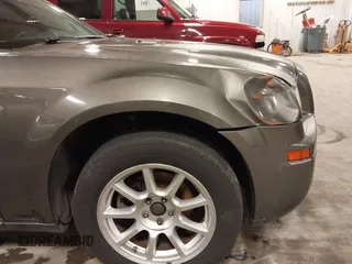 2010 Chrysler 300 Touring with VIN 2C3CA5CV9AH213299, listed as a IAAI auction lot 41754215 with 172,467 mi miles. Bid and sale history available at carsss.com. Image 19.