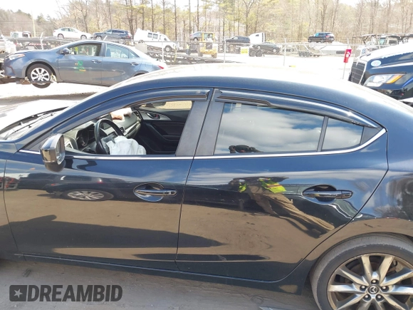 2018 Mazda 3 Touring with VIN 3MZBN1V34JM261565, listed as a IAAI auction lot 41795238 with 121,112 mi miles. Bid and sale history available at carsss.com. Image 15.