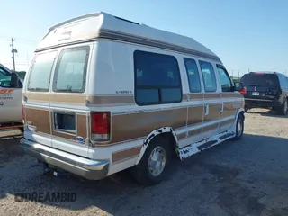 1996 Ford Econoline Cargo with VIN 1FDEE14N4THA59332, listed as a IAAI auction lot 42514910 with 107,511 mi miles and . Bid and sale history available at DreamBid. Image 4.