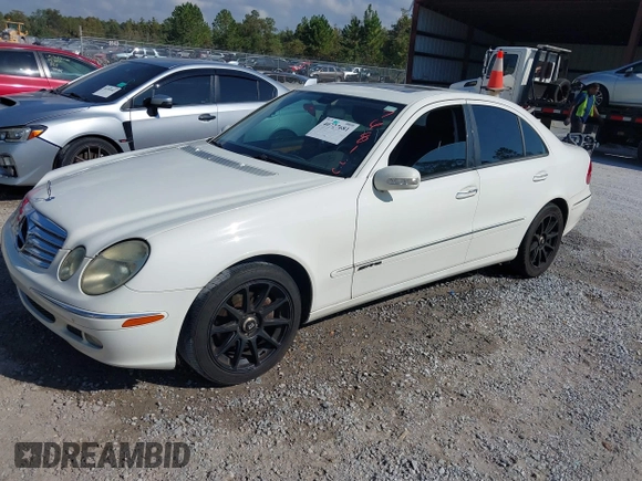 2006 Mercedes-Benz E-Class 3.5L with VIN WDBUF56J66A874920, listed as a IAAI auction lot 40727681 with 141,851 mi miles. Bid and sale history available at carsss.com. Image 2.