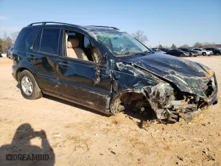 2001 Mercedes-Benz M-Class with VIN 4JGAB54E51A235776, listed as a Copart auction lot 42598025 with 255,845 mi miles and Salvage Title. Bid and sale history available at carsss.com. Image 4.