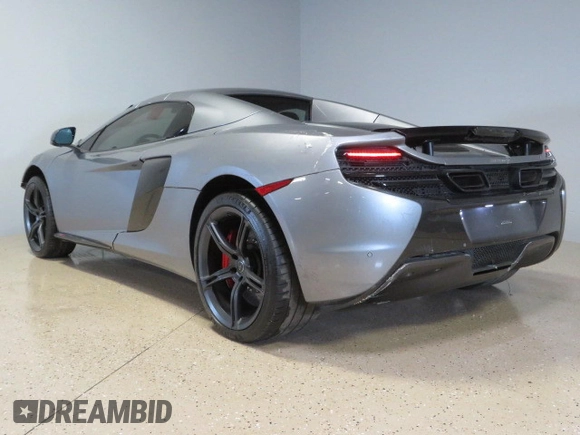 2016 McLaren 650S z VIN SBM11FAA1GW006061, wystawiony jako Copart lot #73406814 z przebiegiem 16 999 mil mil oraz Szkody całkowita. Historia ofert i sprzedaży dostępna na DreamBid. Obrazek 4.