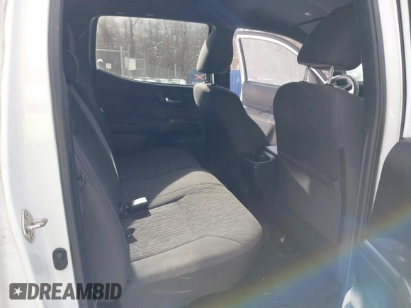 2019 Toyota Tacoma SR z VIN 5TFCZ5AN9KX178090, wystawiony jako IAAI lot #41155337 z przebiegiem 115 265 mil mil oraz . Historia ofert i sprzedaży dostępna na DreamBid. Obrazek 8.