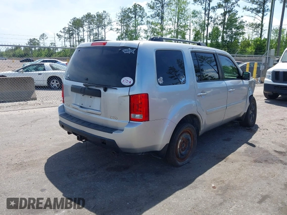 2011 Honda Pilot EX-L with VIN 5FNYF4H60BB096041, listed as a IAAI auction lot 41971952 with 165,868 mi miles and . Bid and sale history available at carsss.com. Image 4.