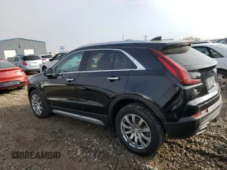 2021 Cadillac XT4 AWD Premium Luxury with VIN 1GYFZDR40MF080166, listed as a Copart auction lot 82883764 with 27,793 mi miles and Salvage Title. Bid and sale history available at carsss.com. Image 2.